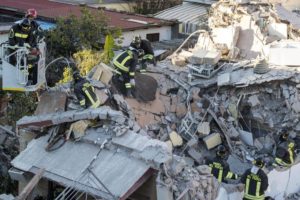 Fire fighters at work in Acilia, on the southern outskirts of Rome, where a two-story building collapsed today, Wednesday, probably because of a gas leak. Two people, a man and a woman, were pulled alive from the rubble. Rome, Italy, Dec. 28, 2016. ANSA/ MASSIMO PERCOSSI